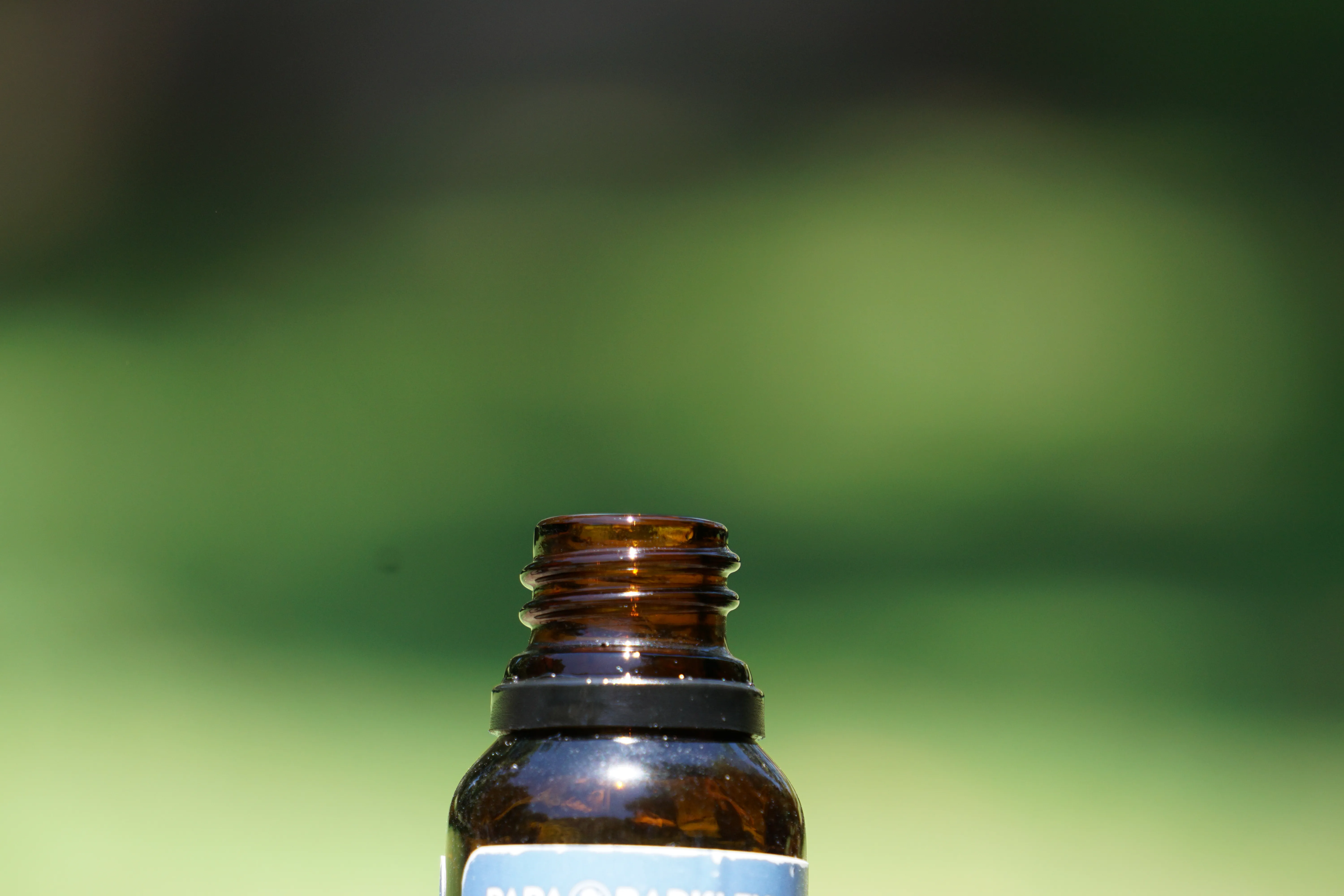 A small bottle of CBD oil with a dropper.